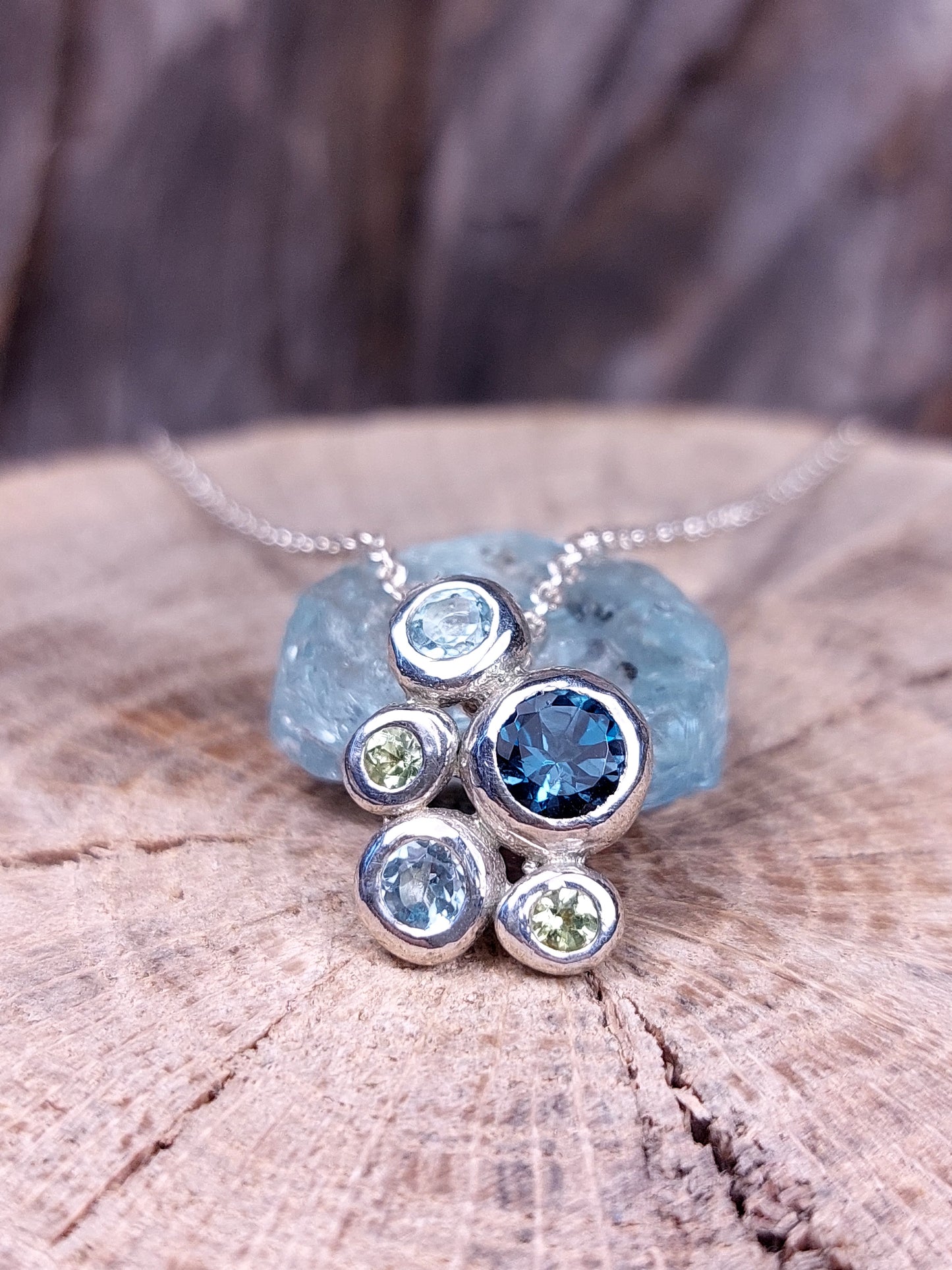 "Ciottoli" In argento con Topazio London, Topazi Sky e Peridoti