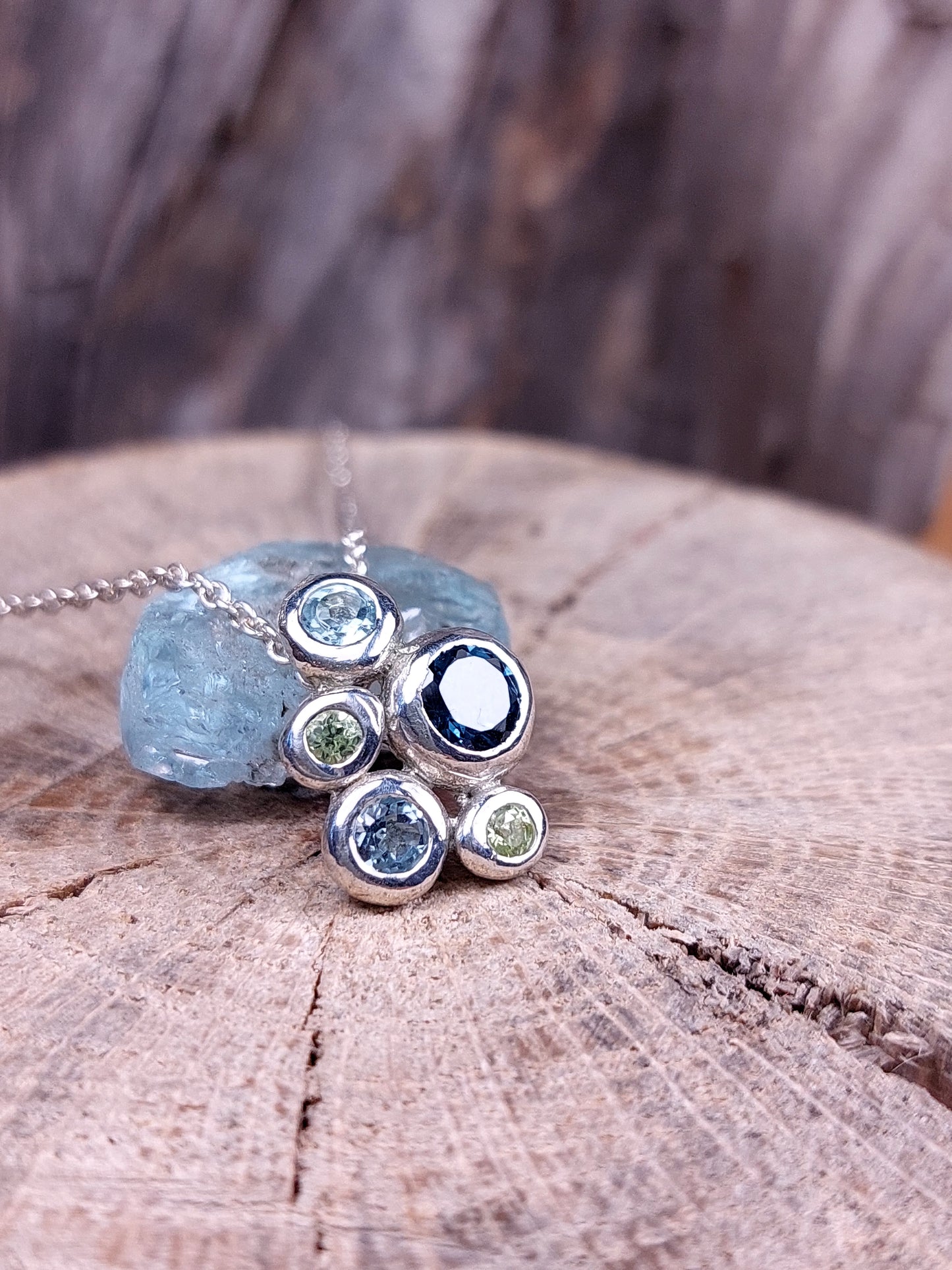 "Ciottoli" In argento con Topazio London, Topazi Sky e Peridoti