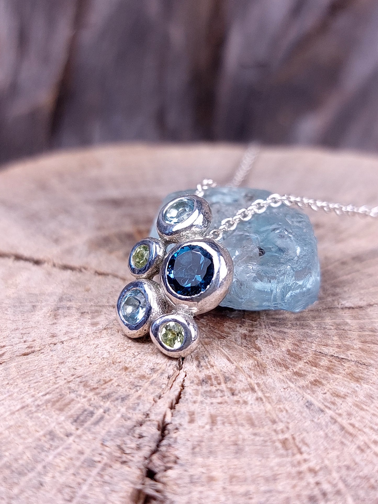 "Ciottoli" In argento con Topazio London, Topazi Sky e Peridoti