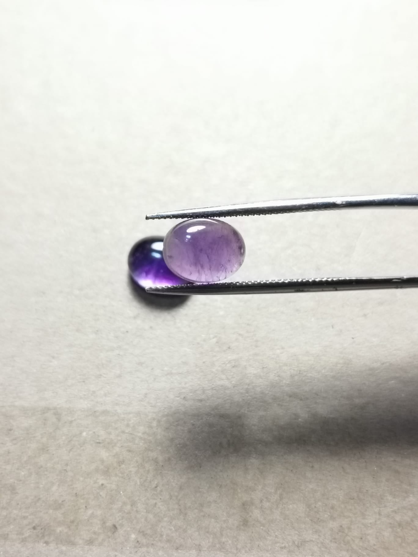 Coppia di Ametiste taglio ovale cabochon 6,43 ct totali
