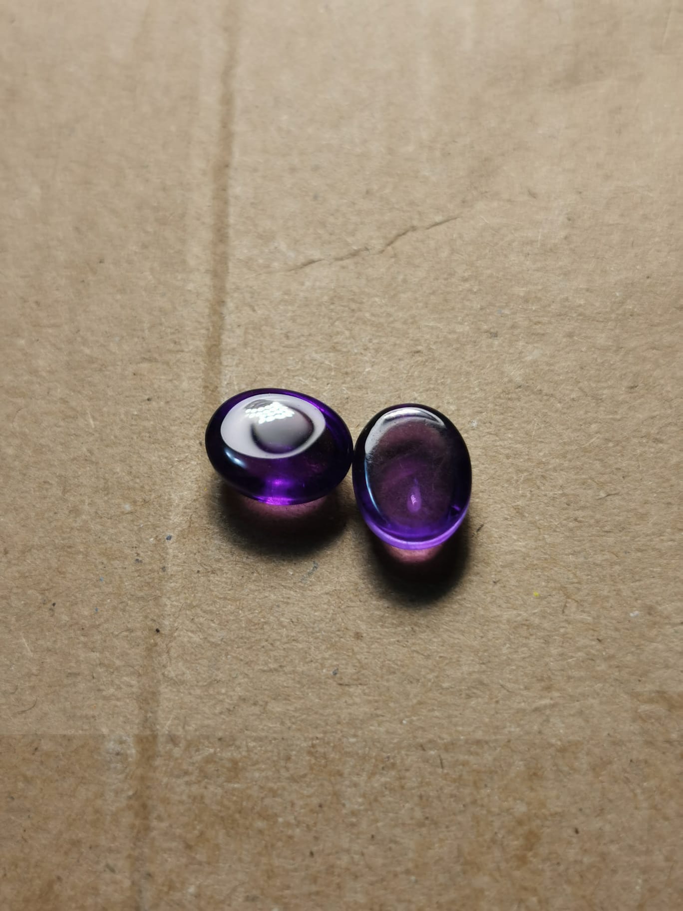Coppia di Ametiste taglio ovale cabochon 6,65 ct totali