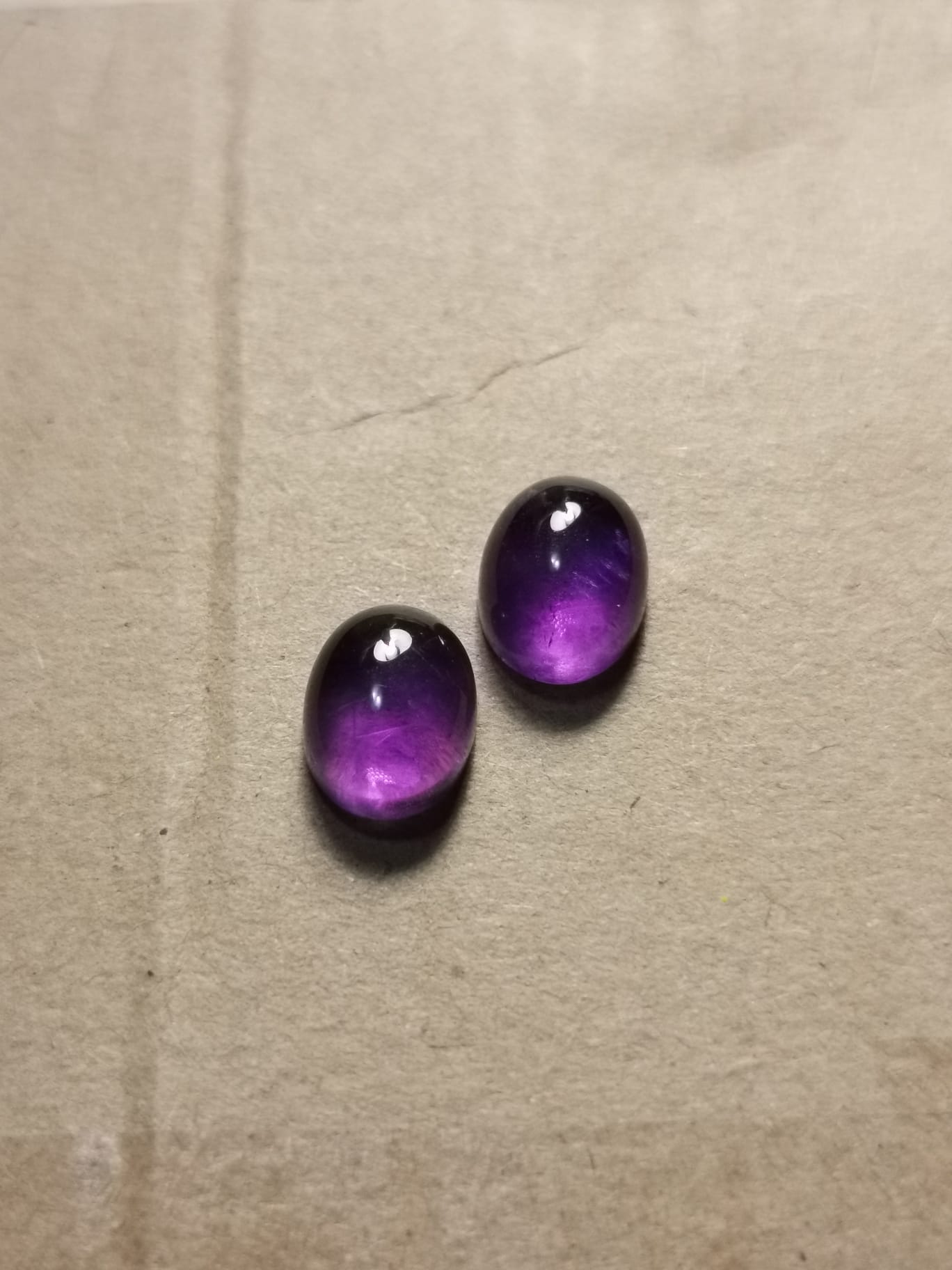 Coppia di Ametiste taglio ovale cabochon 6,70 ct totali