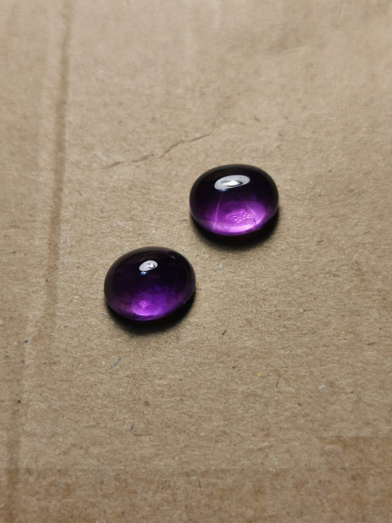 Coppia di Ametiste taglio ovale cabochon 6,65 ct totali