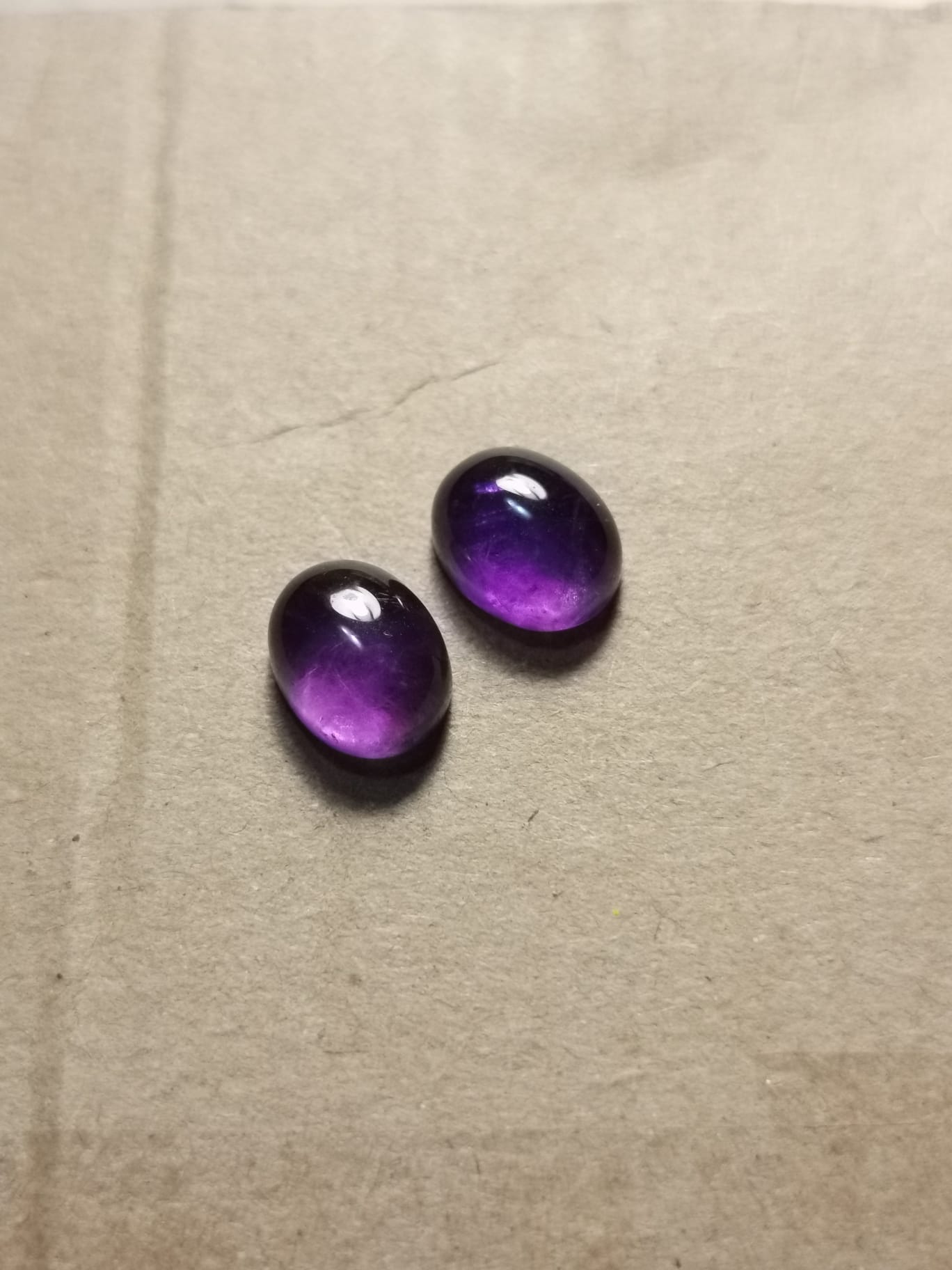 Coppia di Ametiste taglio ovale cabochon 6,70 ct totali