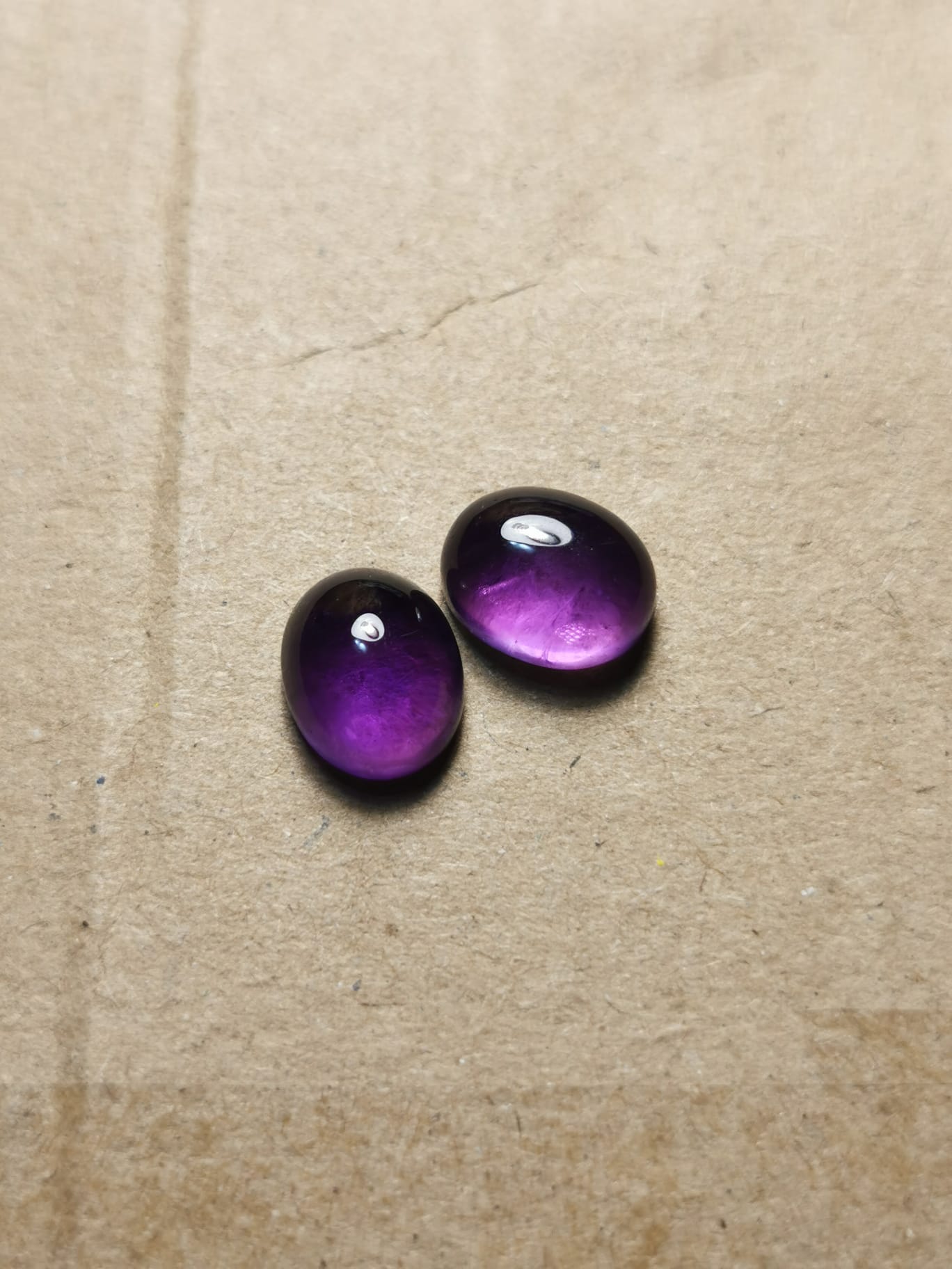 Coppia di Ametiste taglio ovale cabochon 6,65 ct totali