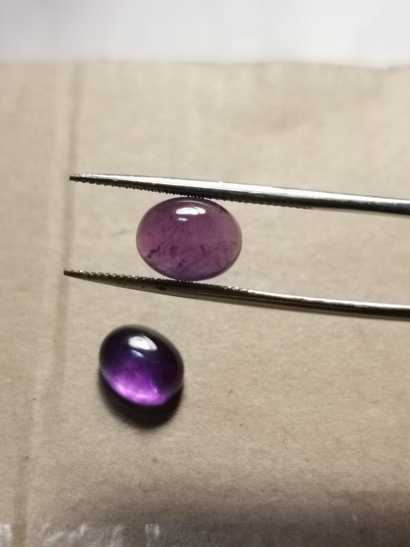 Coppia di Ametiste taglio ovale cabochon 6,70 ct totali