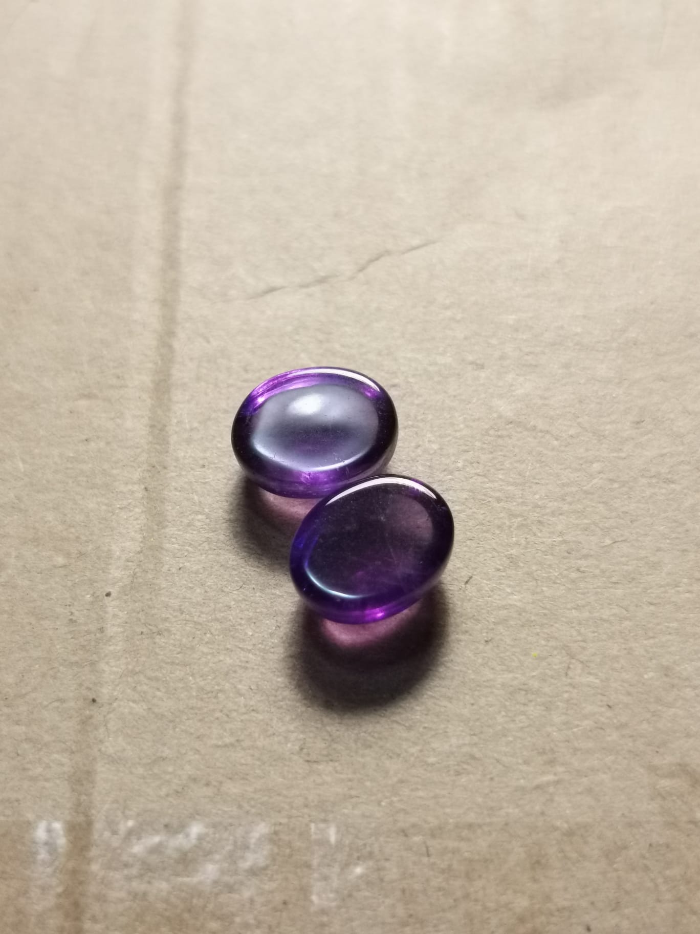 Coppia di Ametiste taglio ovale cabochon 6,70 ct totali