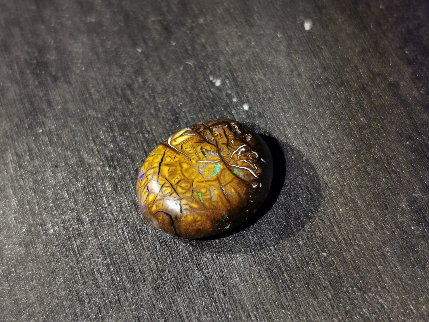 Opale matrice taglio ovale cabochon 6,80 ct