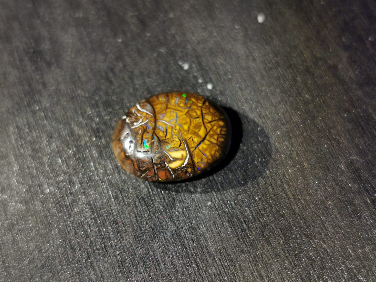 Opale matrice taglio ovale cabochon 6,80 ct
