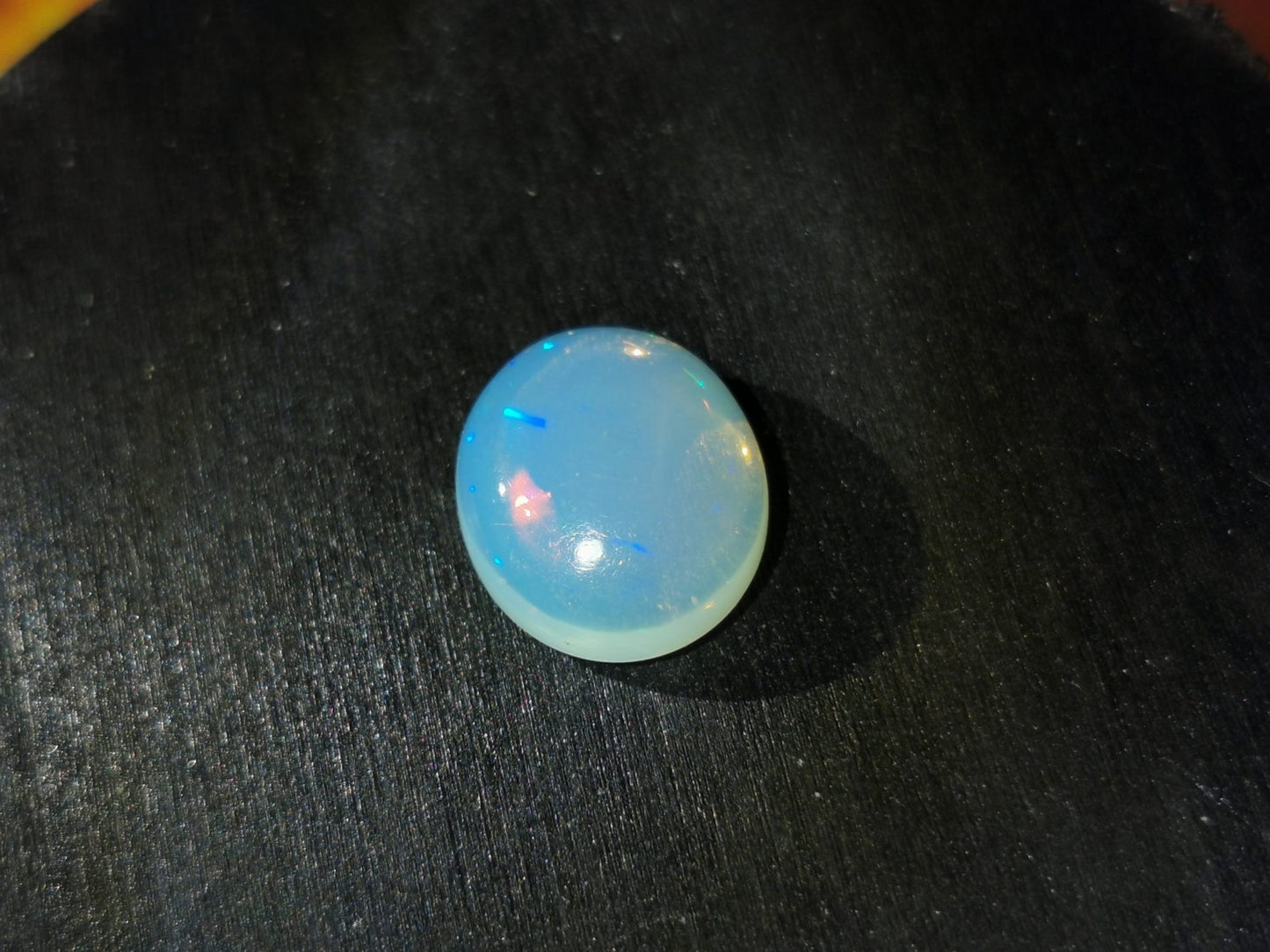 Opale taglio ovale cabochon 6,65 ct