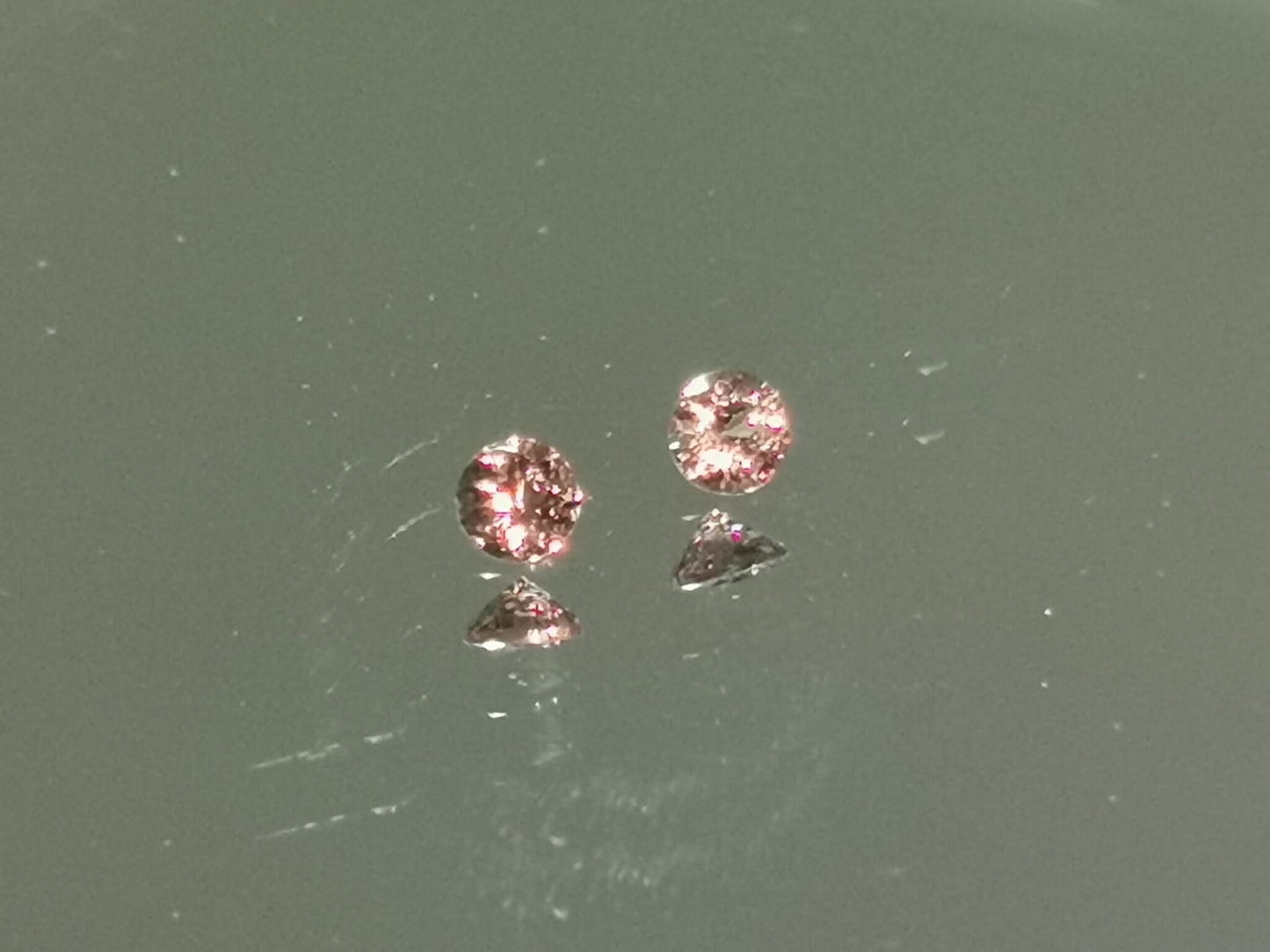 Coppia di Granati cangianti taglio rotondo 0,44 ct