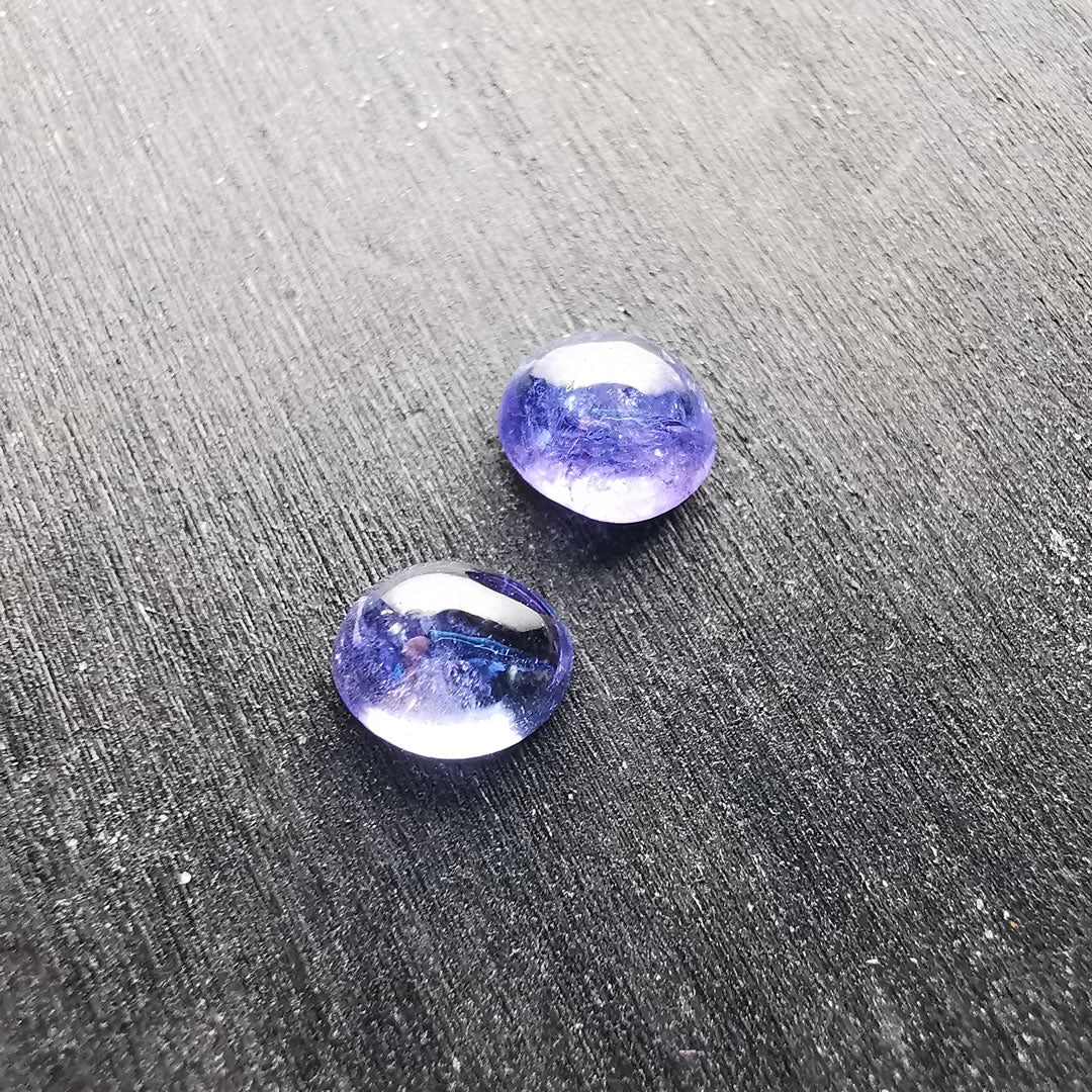 Coppia di Tanzaniti taglio ovale cabochon 1,77 ct