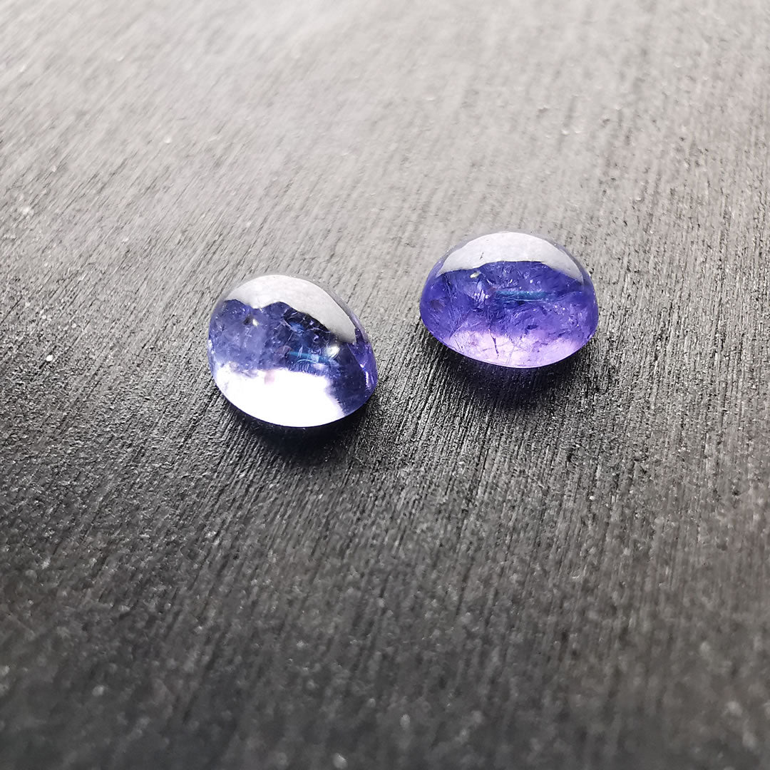 Coppia di Tanzaniti taglio ovale cabochon 1,77 ct