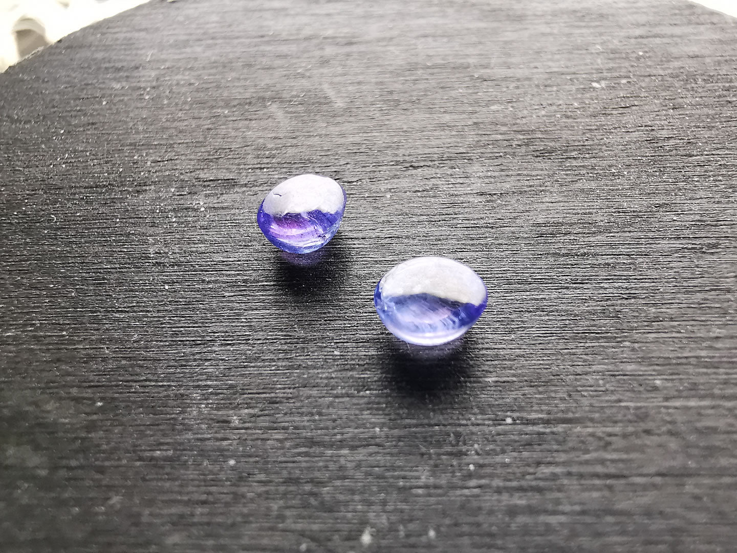Coppia di Tanzaniti taglio ovale cabochon 1,62 ct