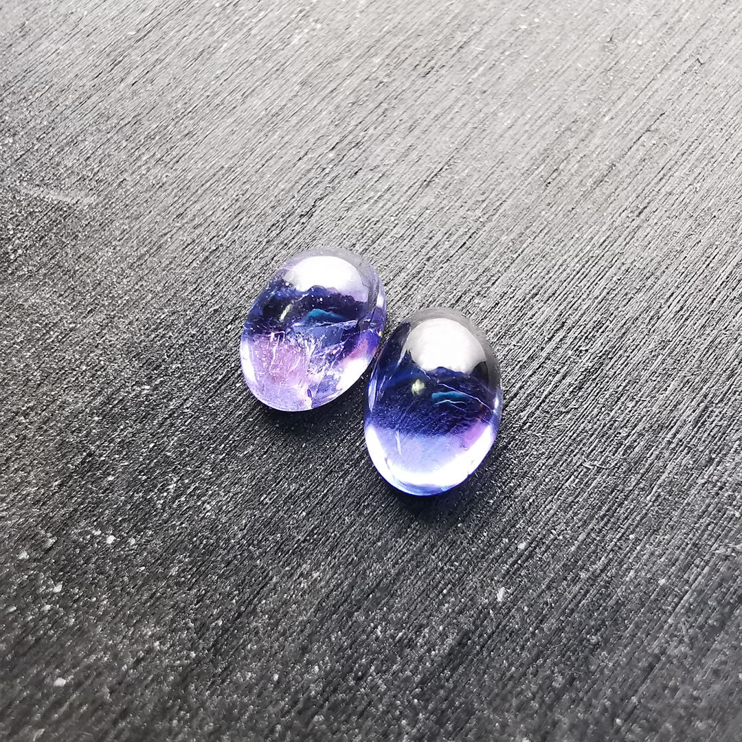 Coppia di Tanzaniti taglio ovale cabochon 1,81 ct