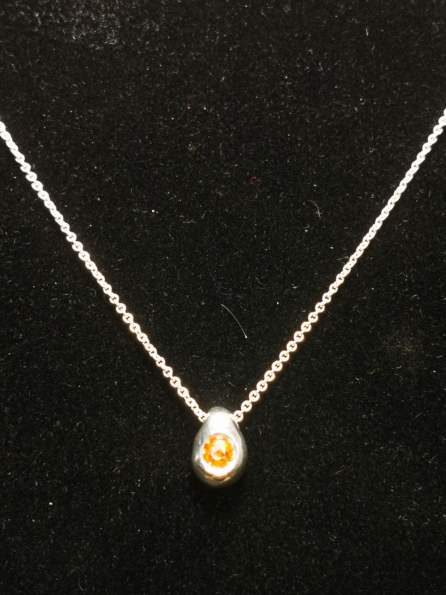 Ciottolo in Argento con Zaffiro Arancio Tondo