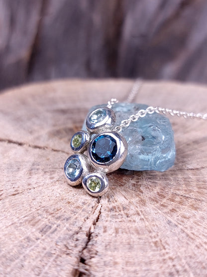 "Ciottoli" In argento con Topazio London, Topazi Sky e Peridoti