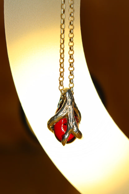 Ciondolo in argento con Ciottolo di Granato Piropo Burattato