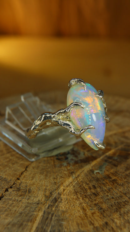 "Roots" ring with drop-shaped Ethiopian opal