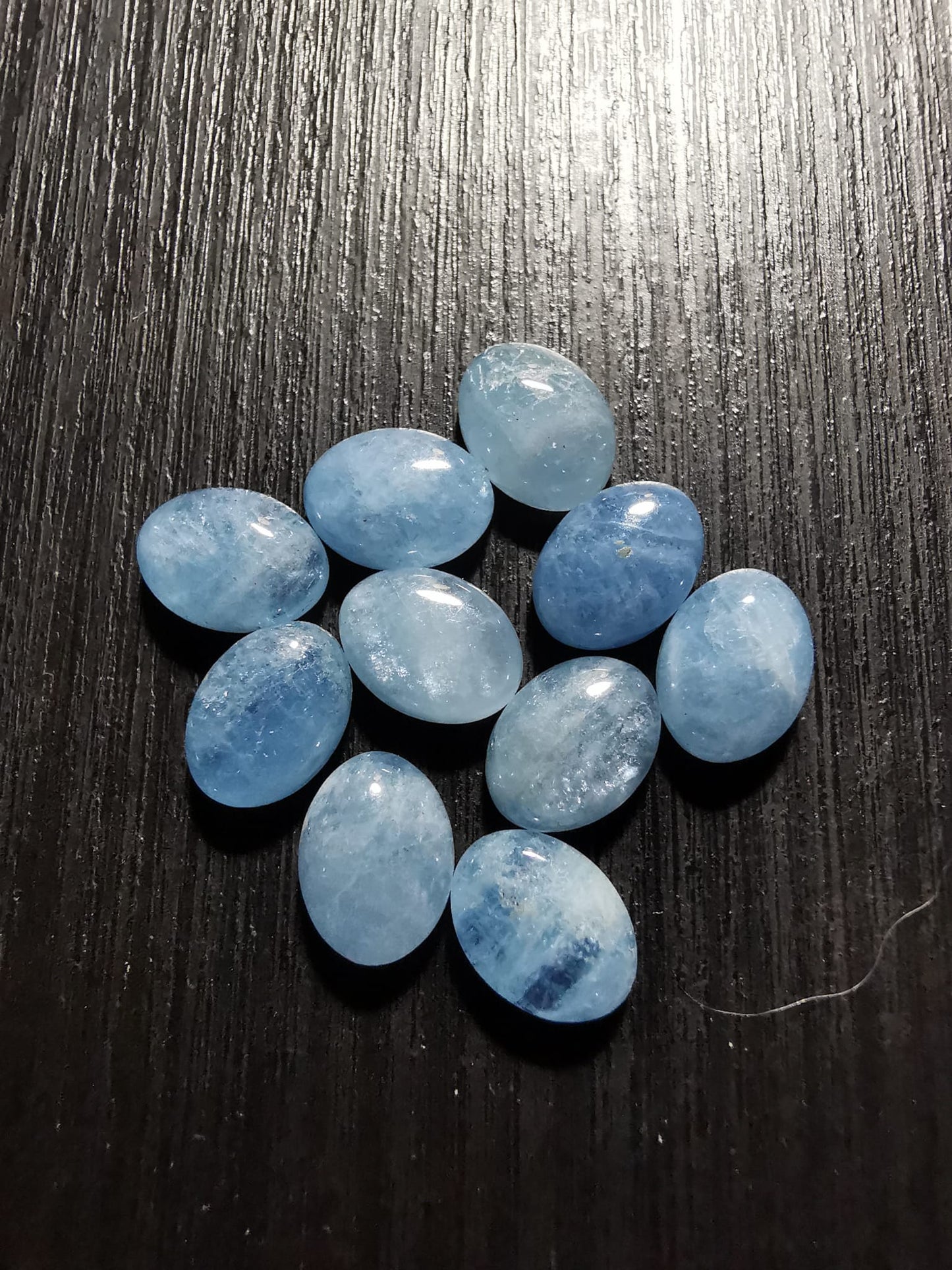 Lotto di dieci Acquamarine taglio ovale cabochon 13,23 ct