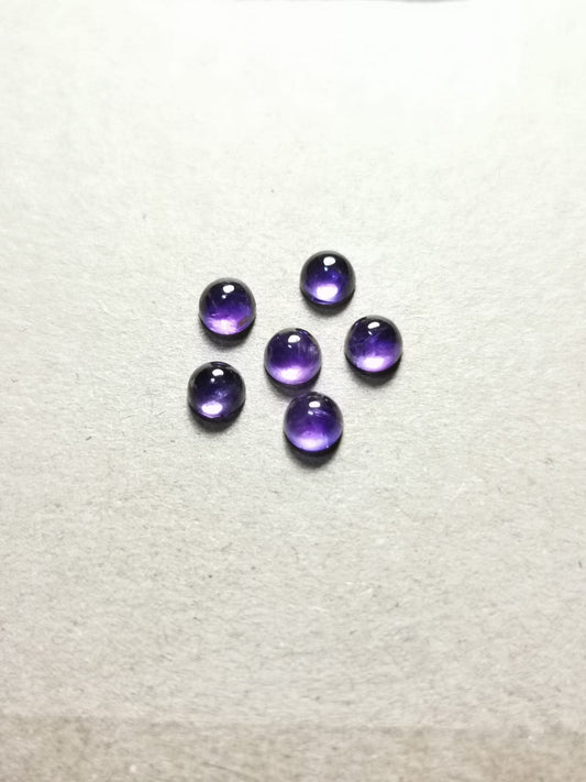 Lotto di sei Ametiste taglio rotondo cabochon 3,19 ct totali
