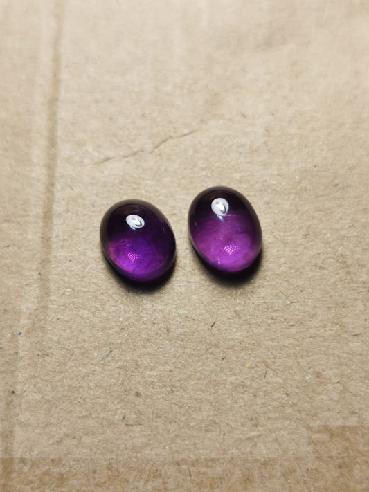 Coppia di Ametiste taglio ovale cabochon 6,65 ct totali