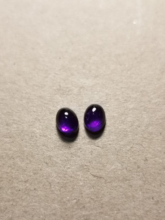 Coppia di Ametiste taglio ovale cabochon 1,87 ct totali