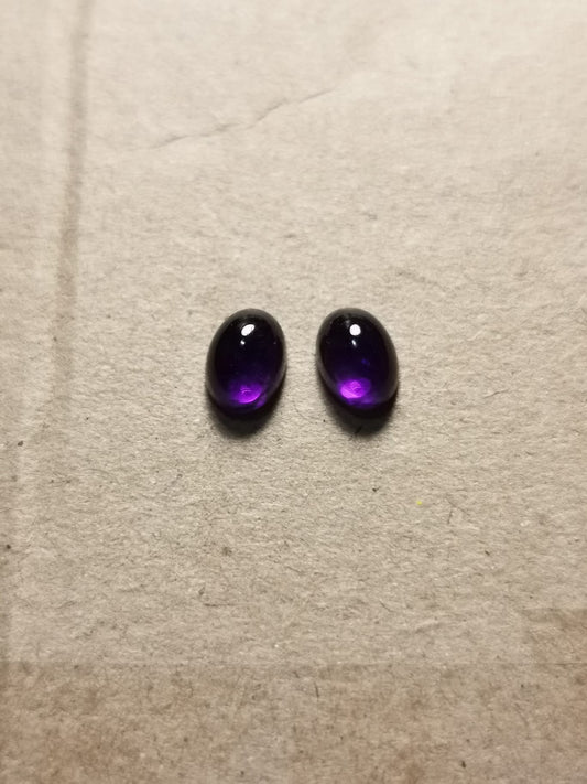 Coppia di Ametiste taglio ovale cabochon 1,89 ct totali