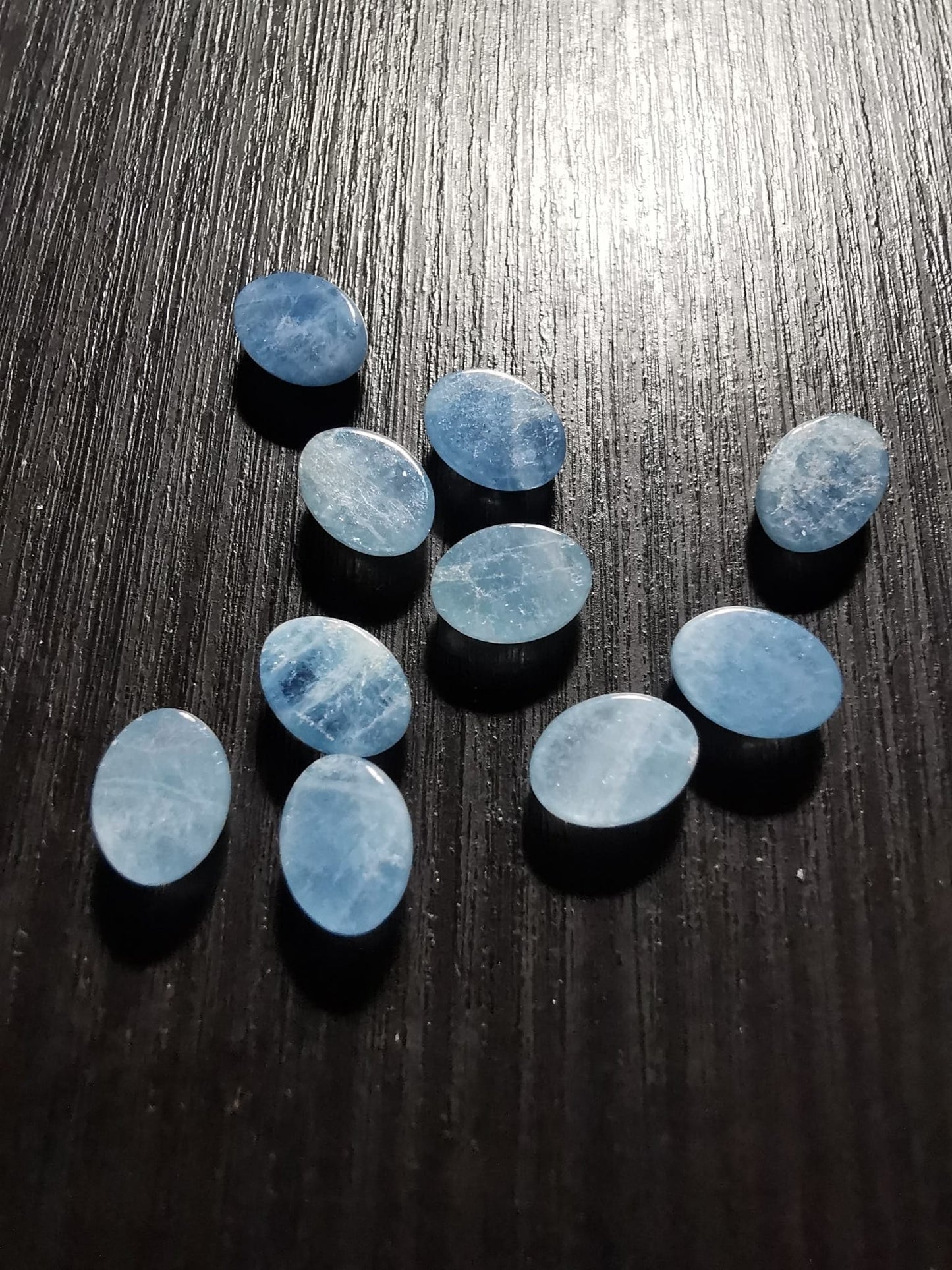 Lotto di dieci Acquamarine taglio ovale cabochon 13,23 ct