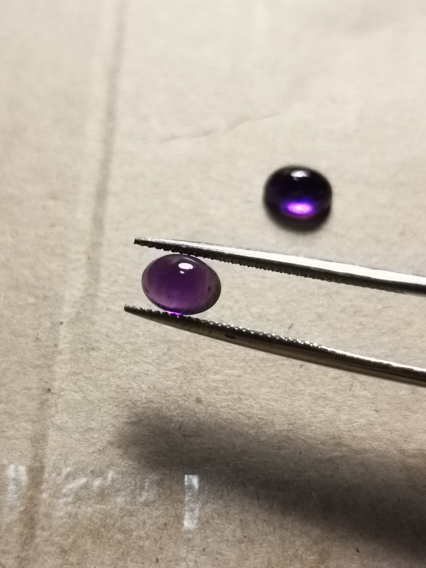 Coppia di Ametiste taglio ovale cabochon 1,89 ct totali