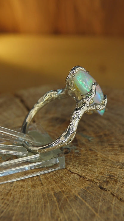 "Roots" ring with drop-shaped Ethiopian opal