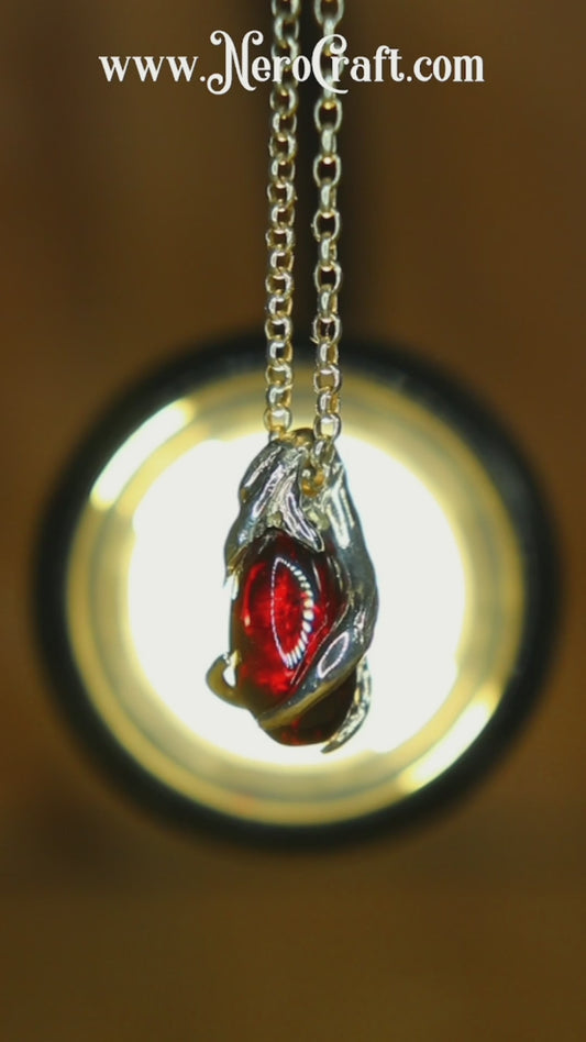 Ciondolo in argento con Ciottolo di Granato Piropo Burattato