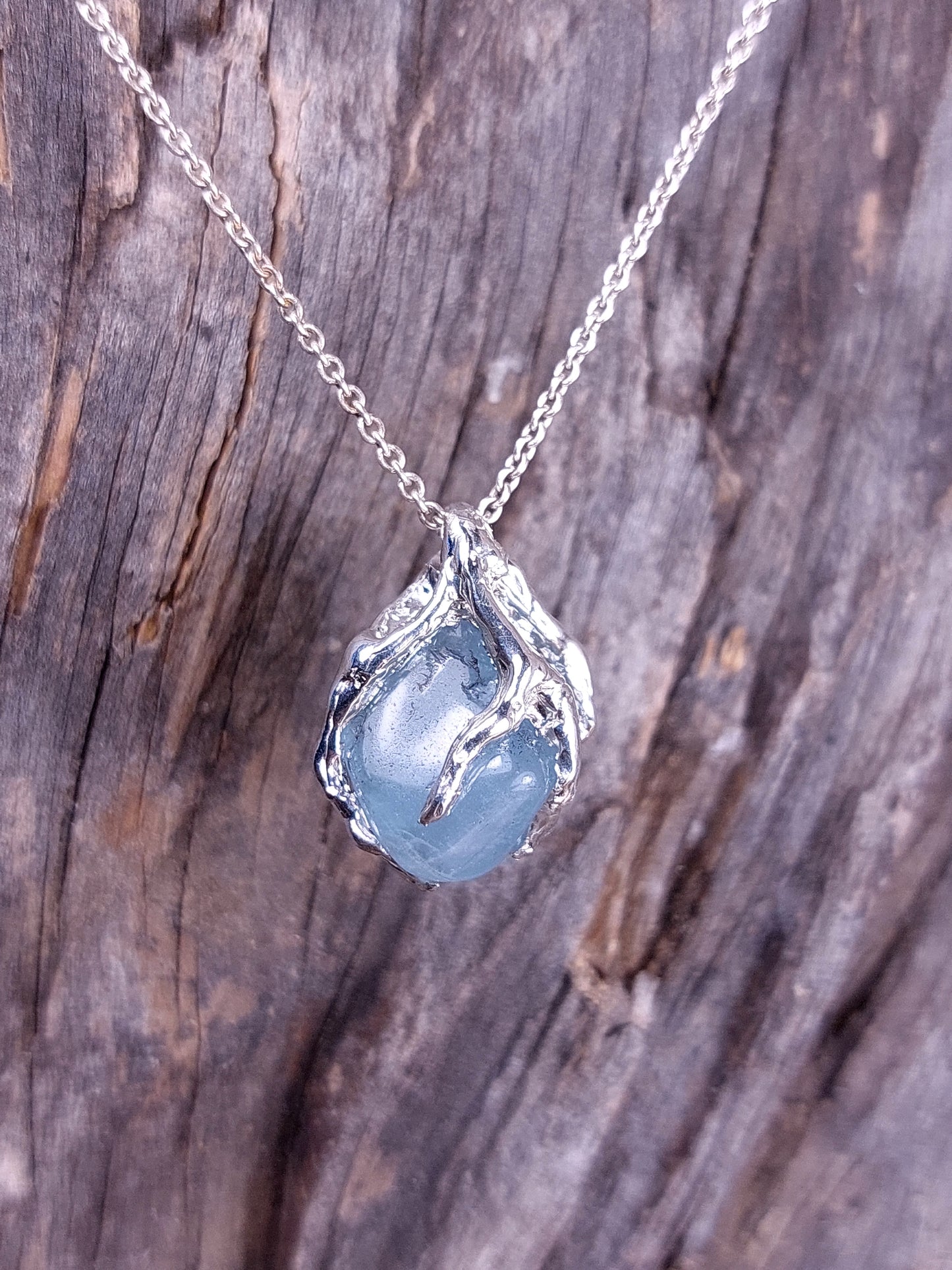 Ciondolo in argento con Ciottolo di acquamarina Burattata