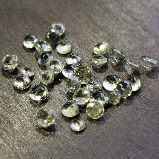 Zaffiri verdi taglio rotondo 8,26 ct totali