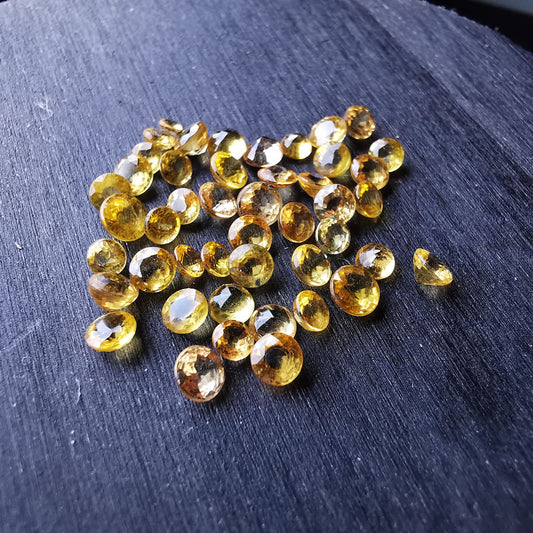 Zaffiri gialli taglio rotondo 8,58 ct totali