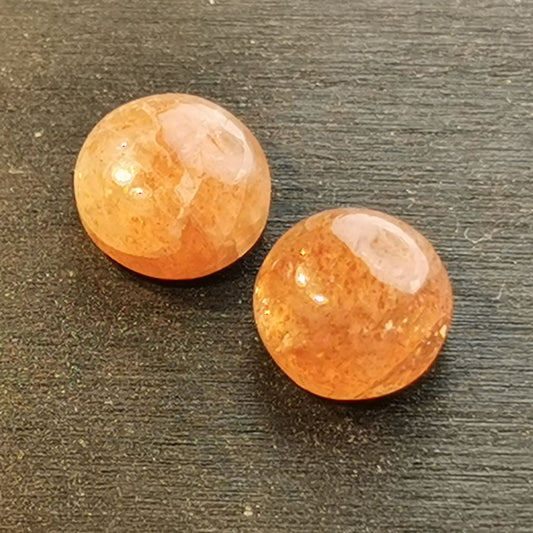 Pietra di Sole taglio rotondo cabochon 6,79 ct