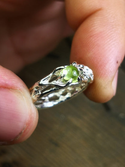 "Bioband" con Peridoto Cabochon