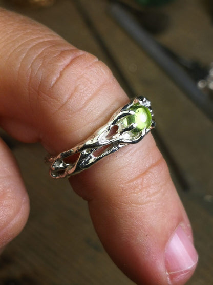 "Bioband" con Peridoto Cabochon
