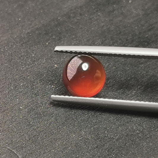 Granato Essonite taglio rotondo cabochon 2,57 ct