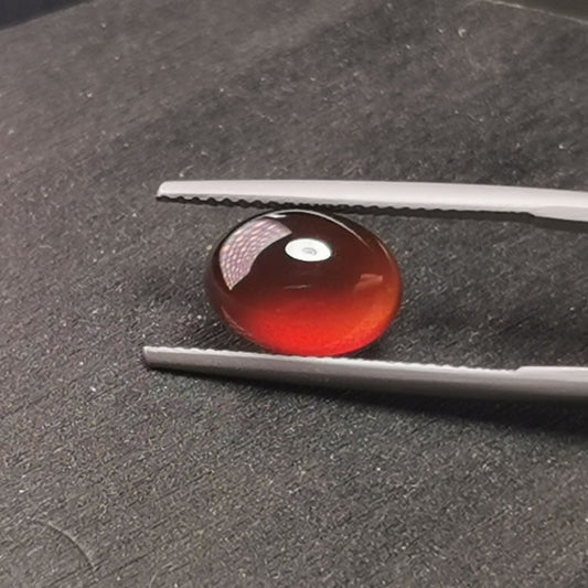 Granato Essonite taglio ovale cabochon 4,12 ct